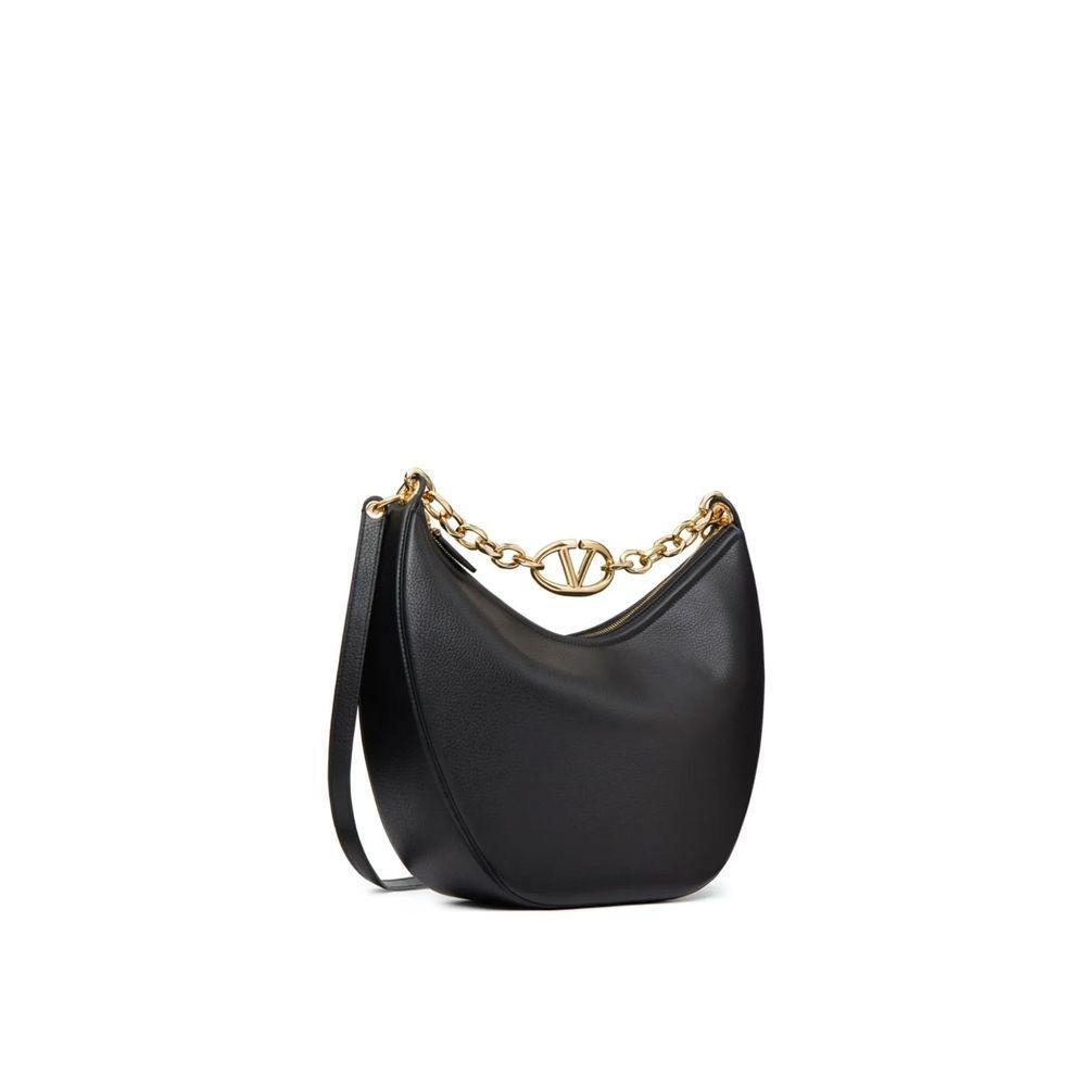 Front view with bag zipped and handles upright.