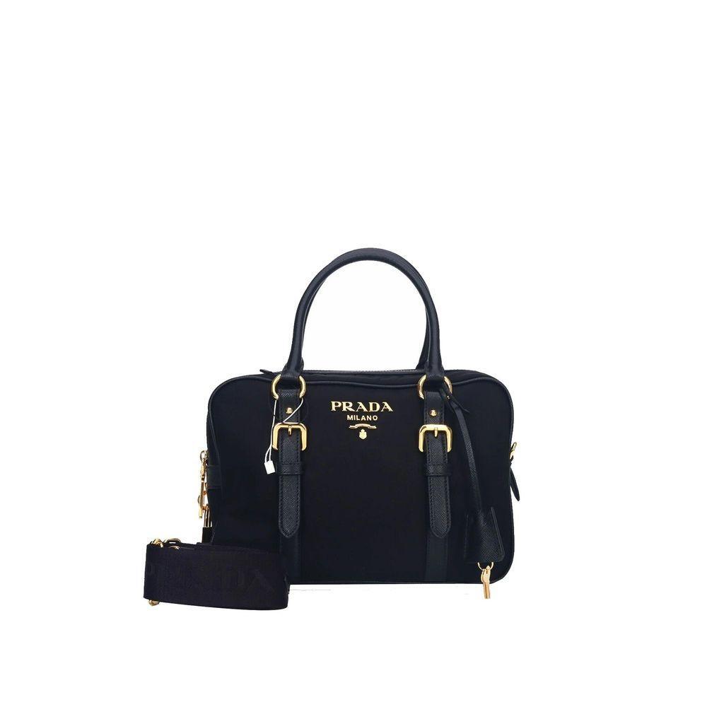 Front view with bag zipped and handles upright.