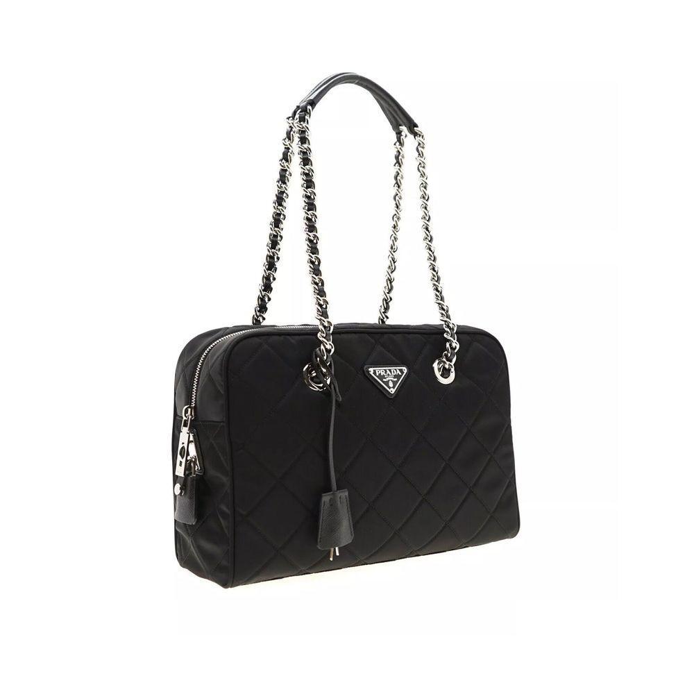 Front view with bag zipped and handles upright.