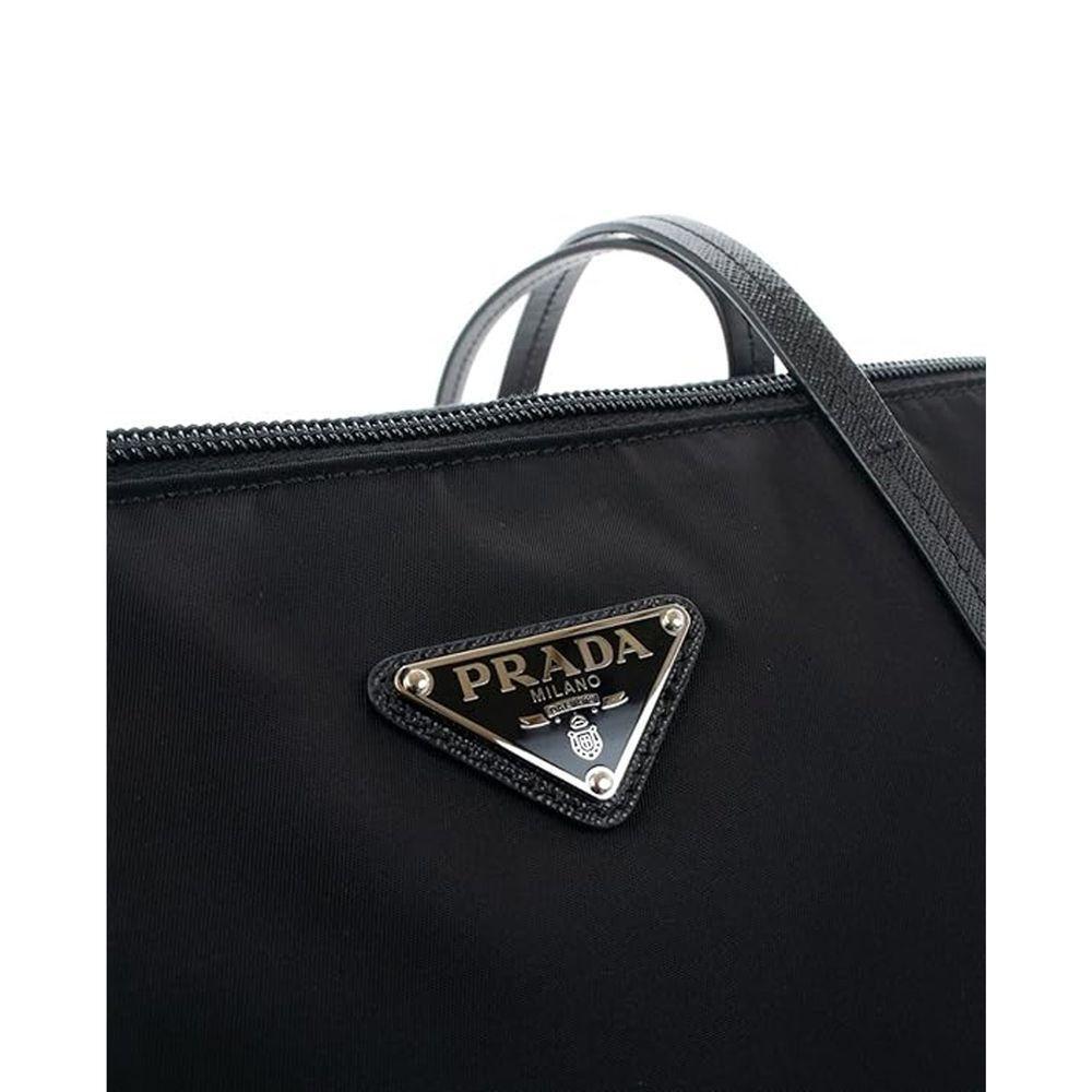 Front view with bag zipped and handles upright.