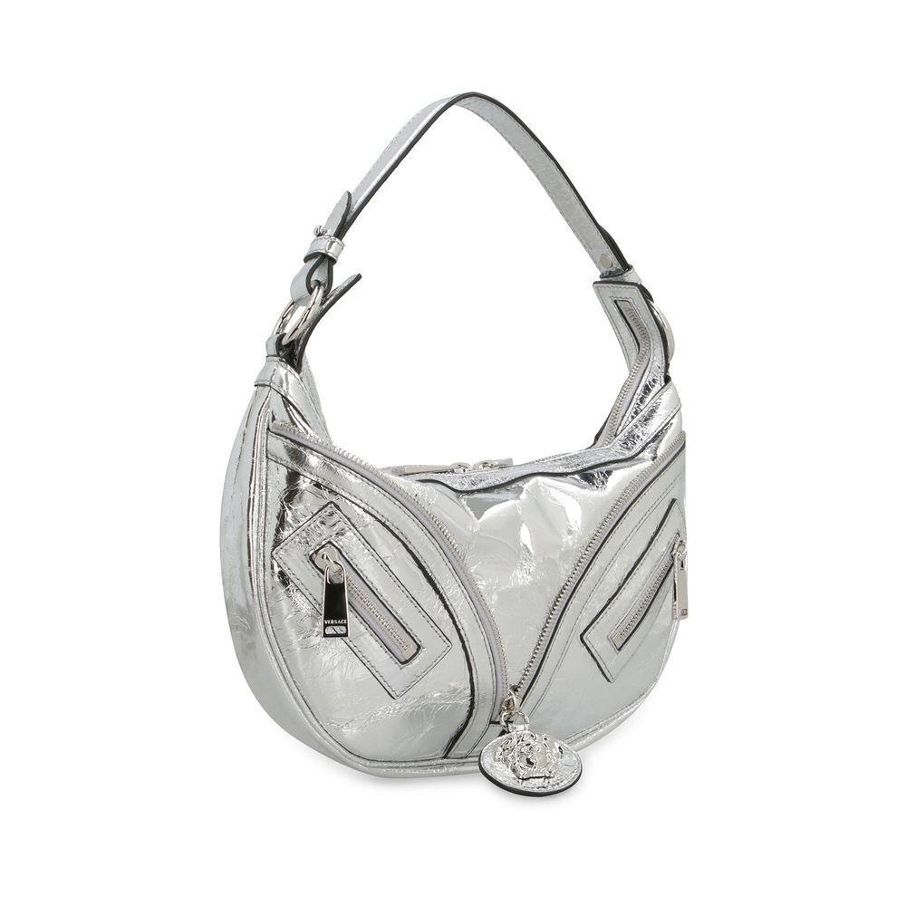 Front view with bag zipped and handles upright.