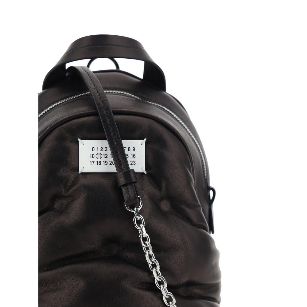 Front view with bag zipped and handles upright.