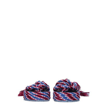 Isabel Marant Blue Fabric Flat Sandals with self-tie closures, casual style, and rubber sole featuring mid heels in blue and pink fabric.