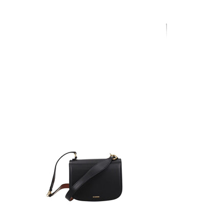 Jil Sander Black Leather Handbag with gold details, front logo, and removable handle, perfect for casual style.