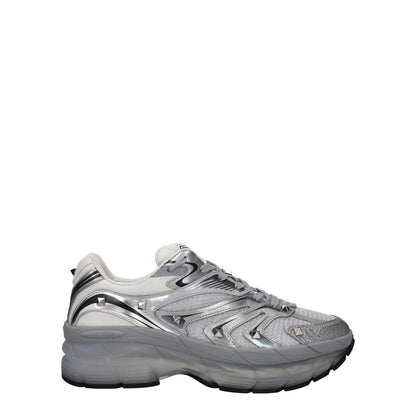Valentino Garavani Gray Fabric Athletic Sneakers with studs and round toe, lace-up closure, leather materials, and rubber sole.