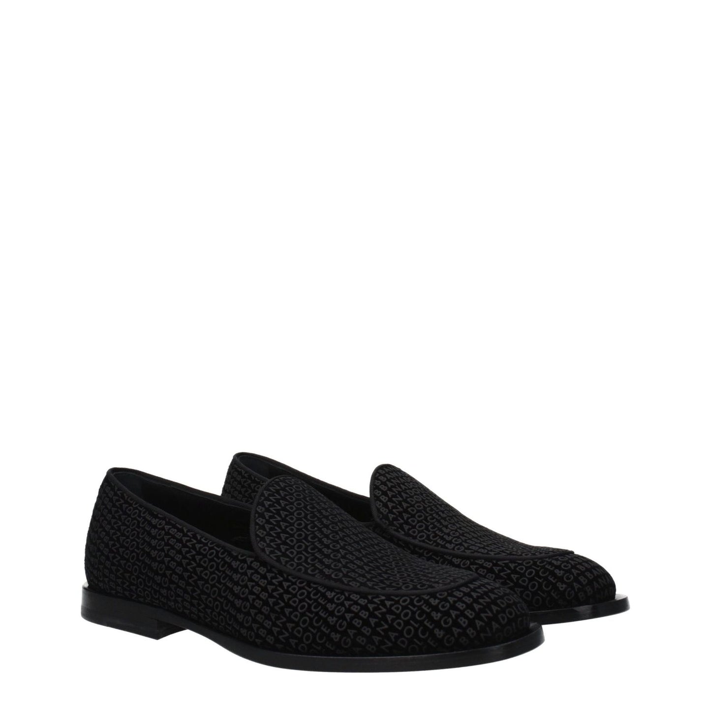 Dolce & Gabbana Black Velvet Slip-On Loafers with logo, low flat heel, round toe, and leather sole in stylish design.