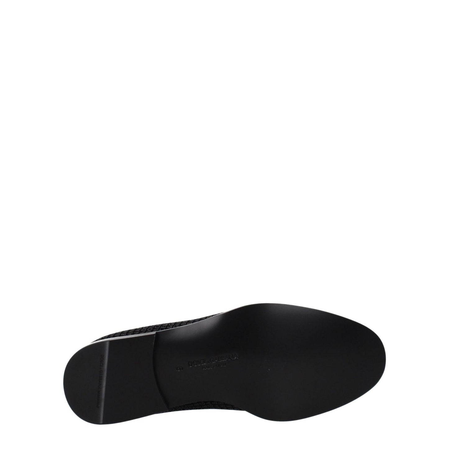 Sole view of Dolce & Gabbana Black Velvet Slip-On Loafers with leather sole and round toe design.