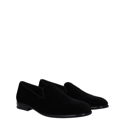Dolce & Gabbana Black Velvet Slip-On Loafers with leather sole and round toe. Low, flat heel by Dolce&Gabbana, black velvet design.