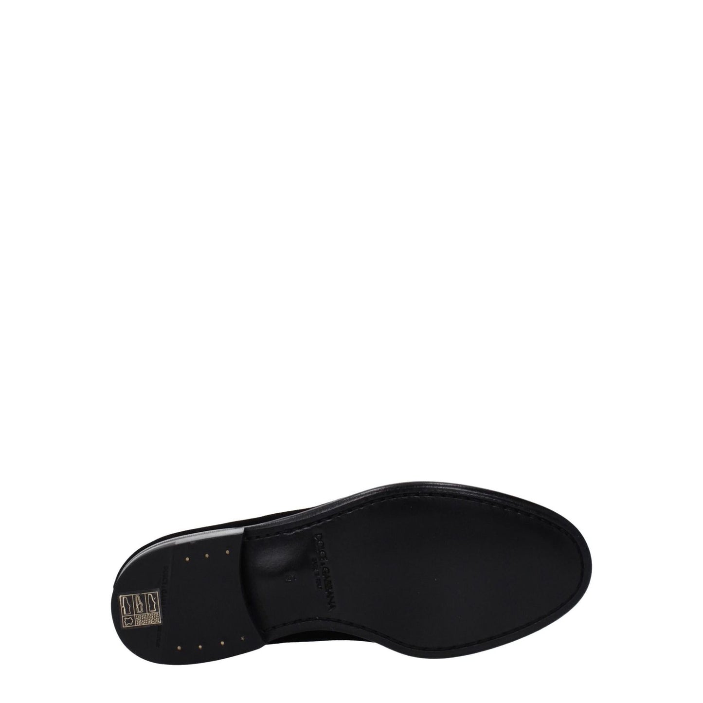Sole view of Dolce & Gabbana Black Velvet Slip-On Loafers with leather sole and round toe design.