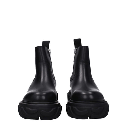 Front view of Off-White Black Leather Ankle Boots with zip closure and rubber soles.