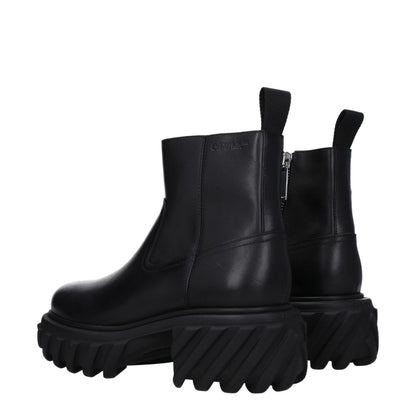 Off-White Black Leather Ankle Boots with side logo and zip closure, featuring mid heels with rubber sole and round toe design.