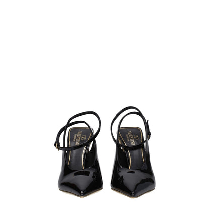 Valentino Garavani Black Leather Sandals with buckle closure and 10.5 cm high heel, front view of pointy toe design in patent leather.