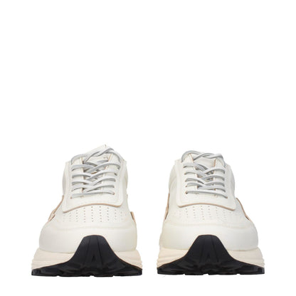 Front view of Buttero White Leather Low Top Sneakers with lace-up closure, rubber sole, and mid heel. Casual style with logos.