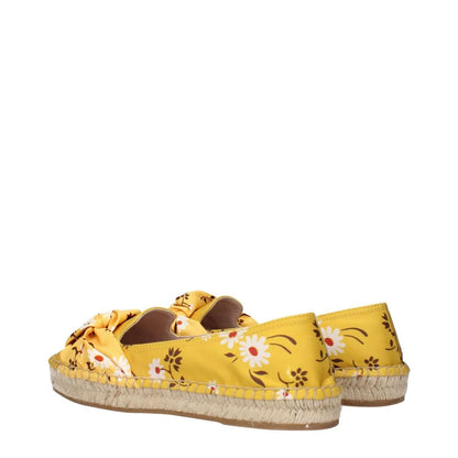 Miu Miu Yellow Fabric Espadrilles with floral pattern and front detail, showcasing stylish summer footwear design.