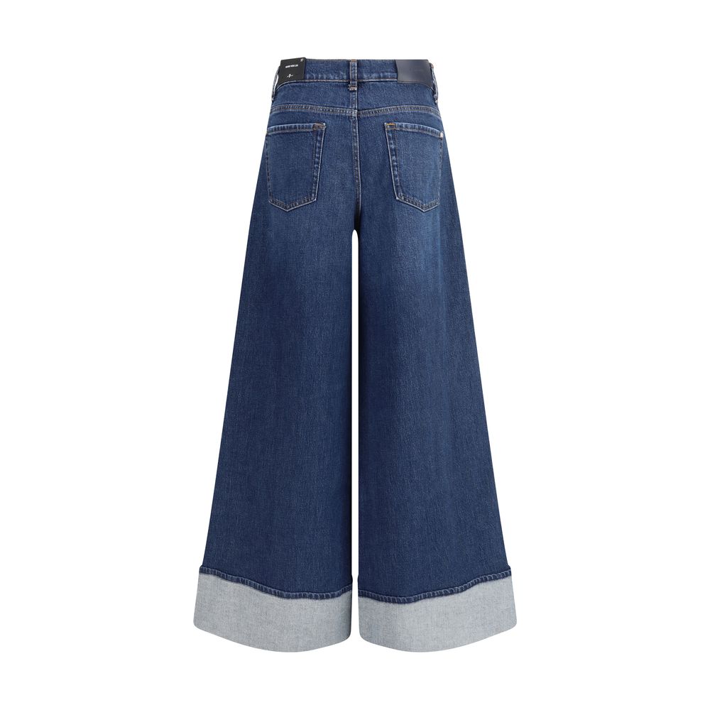 Back view of 7FOR Blue Cotton Jeans Denim with wide leg silhouette and turn-up hems, showcasing the classic five-pocket design and modern fit.