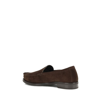 Prada Brown Calf Leather Bos Taurus Slip-On Loafers with suede finish and rubber sole, side view.