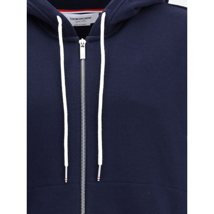Thom Browne Blue Cotton Sweatshirt with drawstring hood and front zipper, featuring contrasting cuffs and signature patch for AW25.