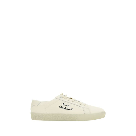 Saint Laurent White Rubber Low Top Sneakers with round toe, lace-up closure, crater-effect sole, and contrast embroidery.