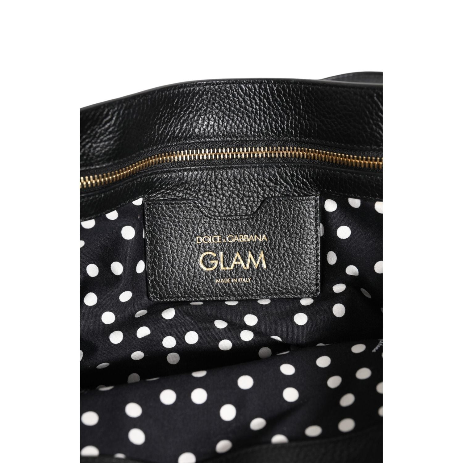 Front view with bag zipped and handles upright.