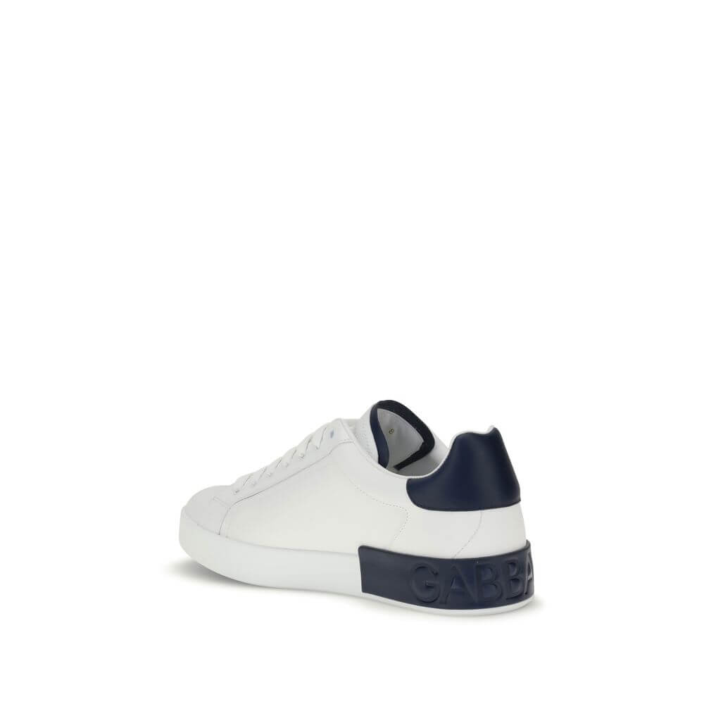 Dolce & Gabbana White Calf Leather Bos Taurus Low Top Sneakers with navy heel and logo stripe, rear view on a white background