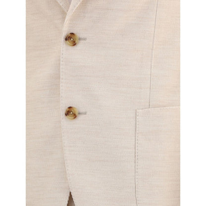 Close-up of Lardini Beige Cotton Two-Piece Suit blazer with button details and patch pocket, showcasing elegant corduroy texture.