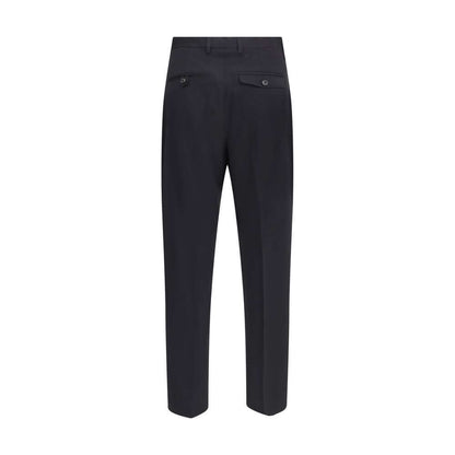 Back view of Our Legacy Black Fleece Wool Chino Pants, showcasing minimalist design and straight leg fit.
