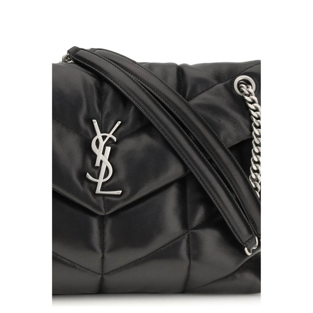Saint Laurent Black Lamb Ovis Aries Aries Shoulder Bag with silver YSL plaque and leather-braided chain strap on quilted design.