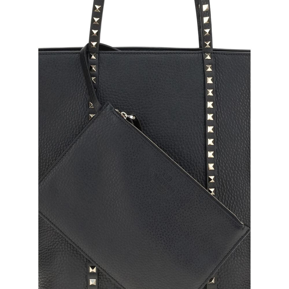 Valentino Garavani Black Calf Leather Bos Taurus Shoulder Bag with Rockstud accents and removable pouch.