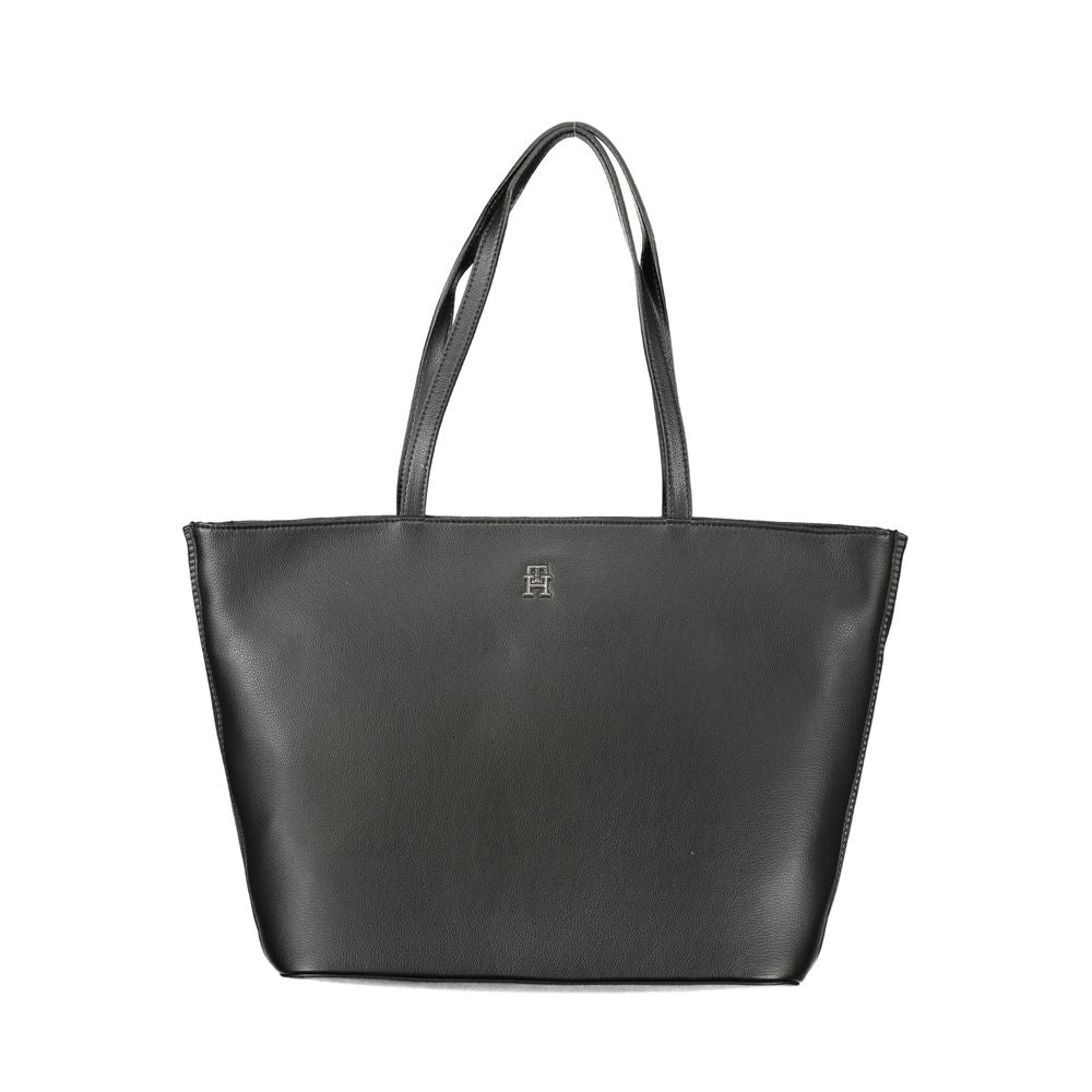 Front view with bag zipped and handles upright.