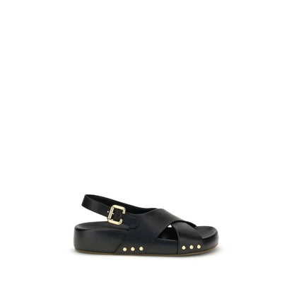 Chloé Mae Sandals with black crossed straps, gold Paddington buckle, and studs, featuring a comfortable anatomical insole.