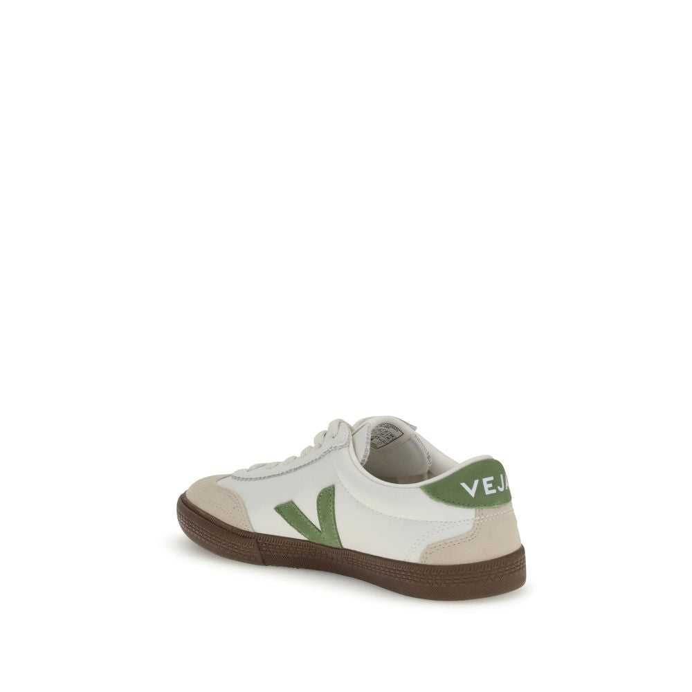 Veja White Leather Low Top Sneakers with green logo and flat sole, inspired by 1970s Brazilian volleyball shoes, sustainable style.
