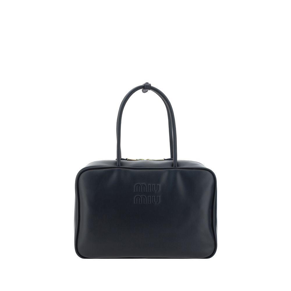 Front view with bag zipped and handles upright.