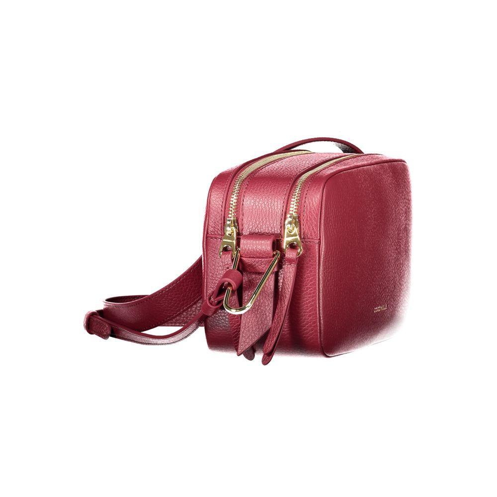 Front view with bag zipped and handles upright.