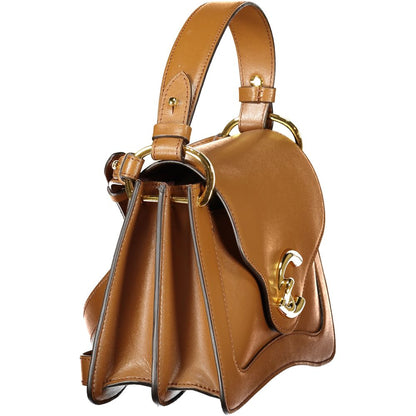 Coccinelle Brown Leather Women Handbag with gold accents and adjustable strap, showcasing elegant design and craftsmanship.