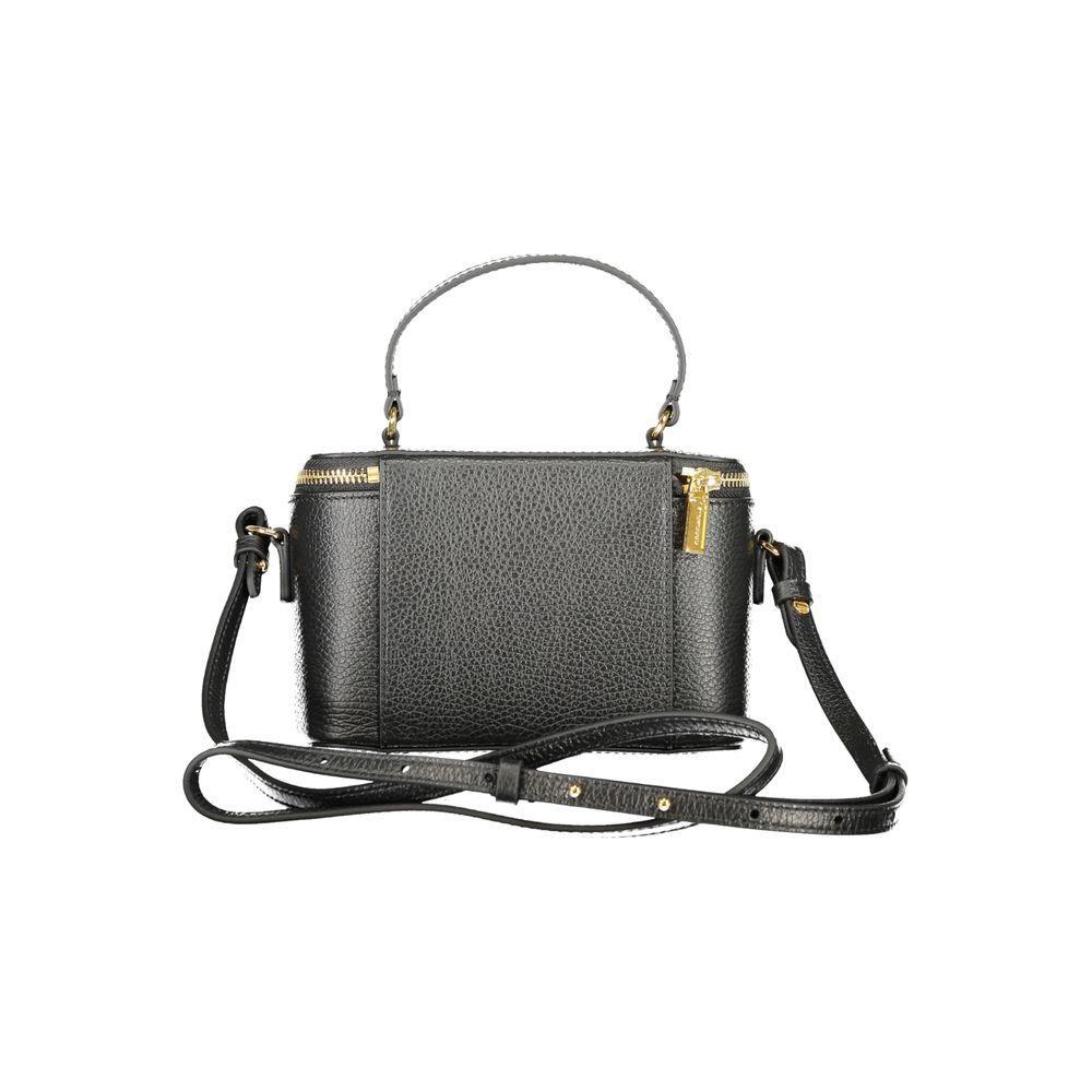 Front view with bag zipped and handles upright.