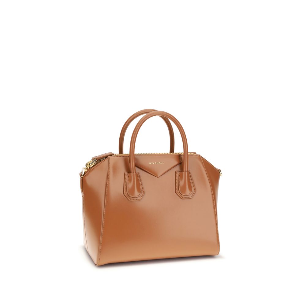 Givenchy Brown Calf Leather Bos Taurus Handbag with round handles and glossy finish, featuring a laminated logo on the front.