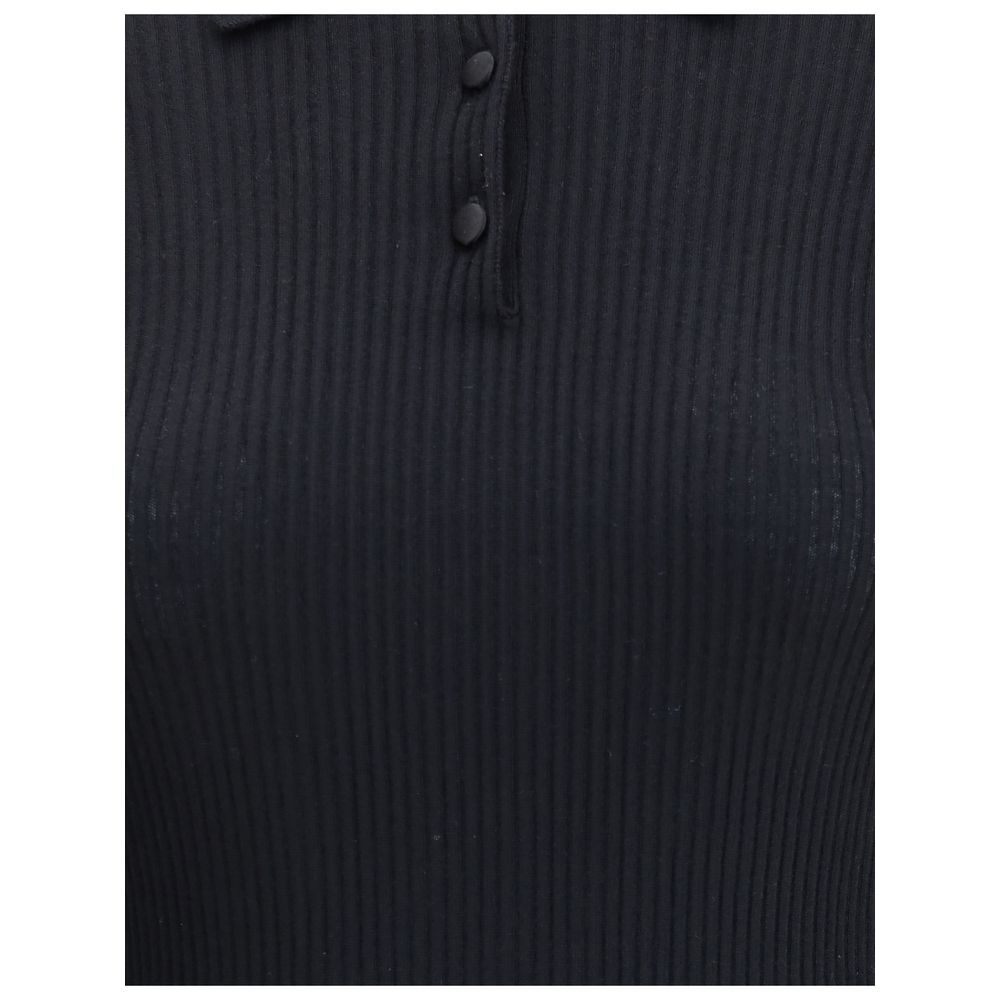 Dolce & Gabbana Black Cashmere Polo Shirt with ribbed design and three-button closure for refined style and versatile elegance.