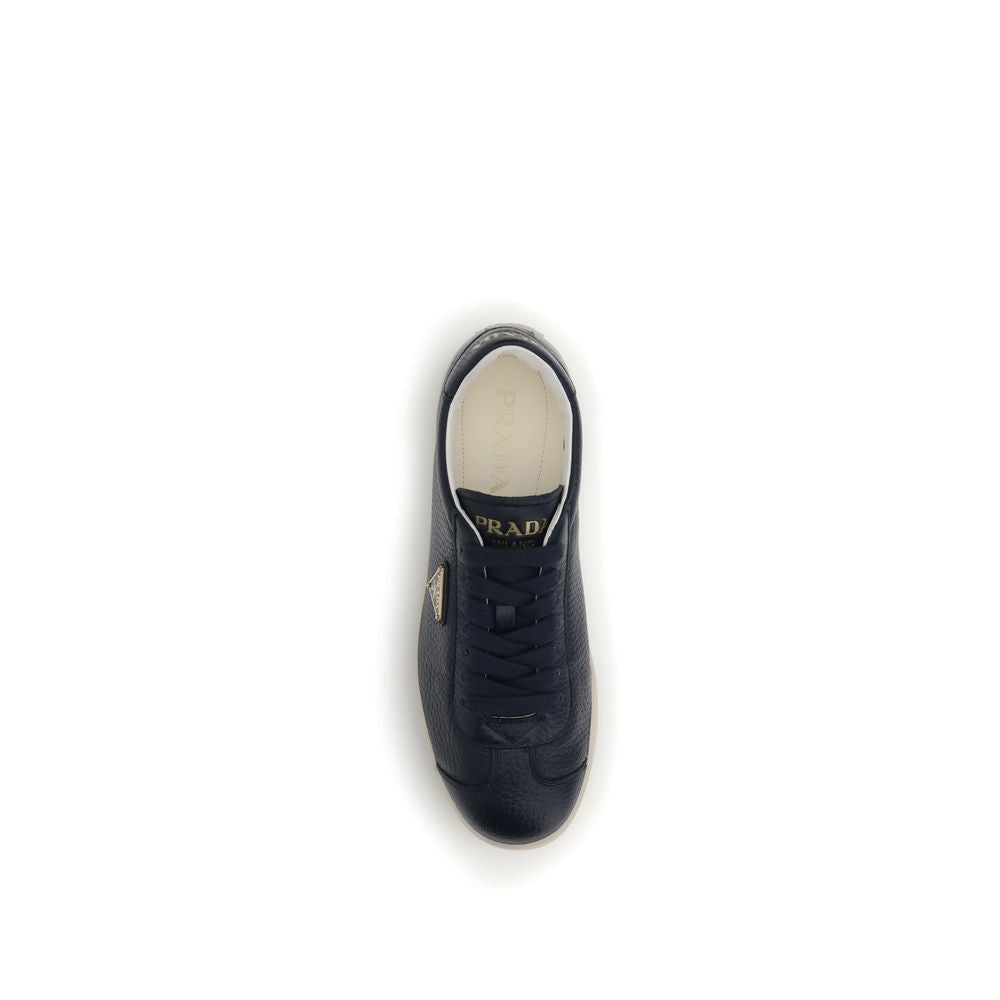 Prada Blue Calf Leather Bos Taurus Low Top Sneakers with embossed logo and padded ankle, top view.