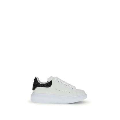 Alexander McQueen White Leather Chunky Sneakers with black crystal heel, oversized silhouette, and bold rubber sole. AW25 collection.