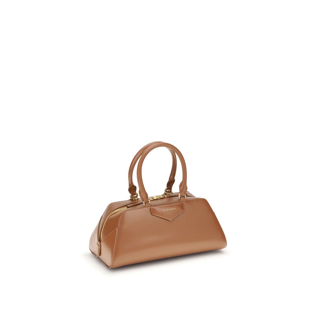 Givenchy Brown Calf Leather Bos Taurus Handbag with elegant structured design and embossed signature on front.