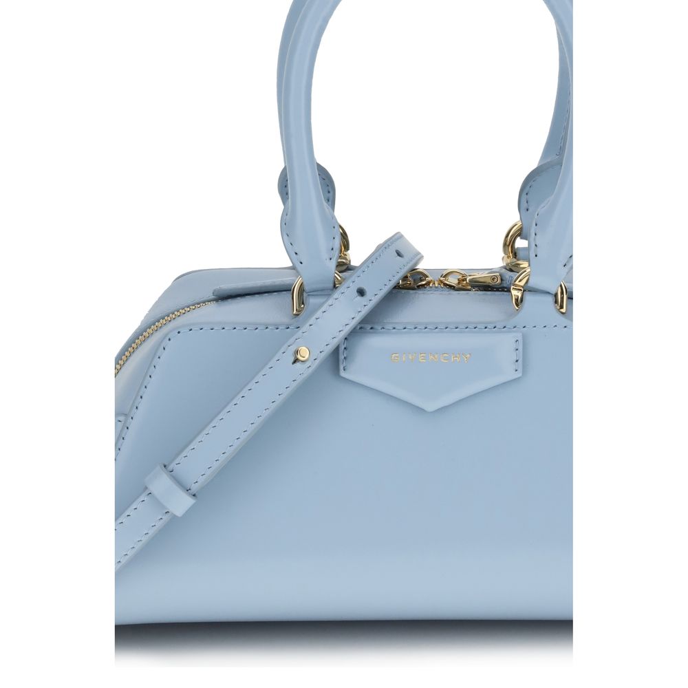 Givenchy Light Blue Calf Leather Bos Taurus Handbag with gold-finish detailing and pentagonal signature appliqué.