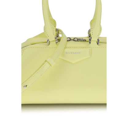Givenchy Yellow Calf Leather Bos Taurus Handbag - Antigona East-West Mini with embossed signature and removable shoulder strap.