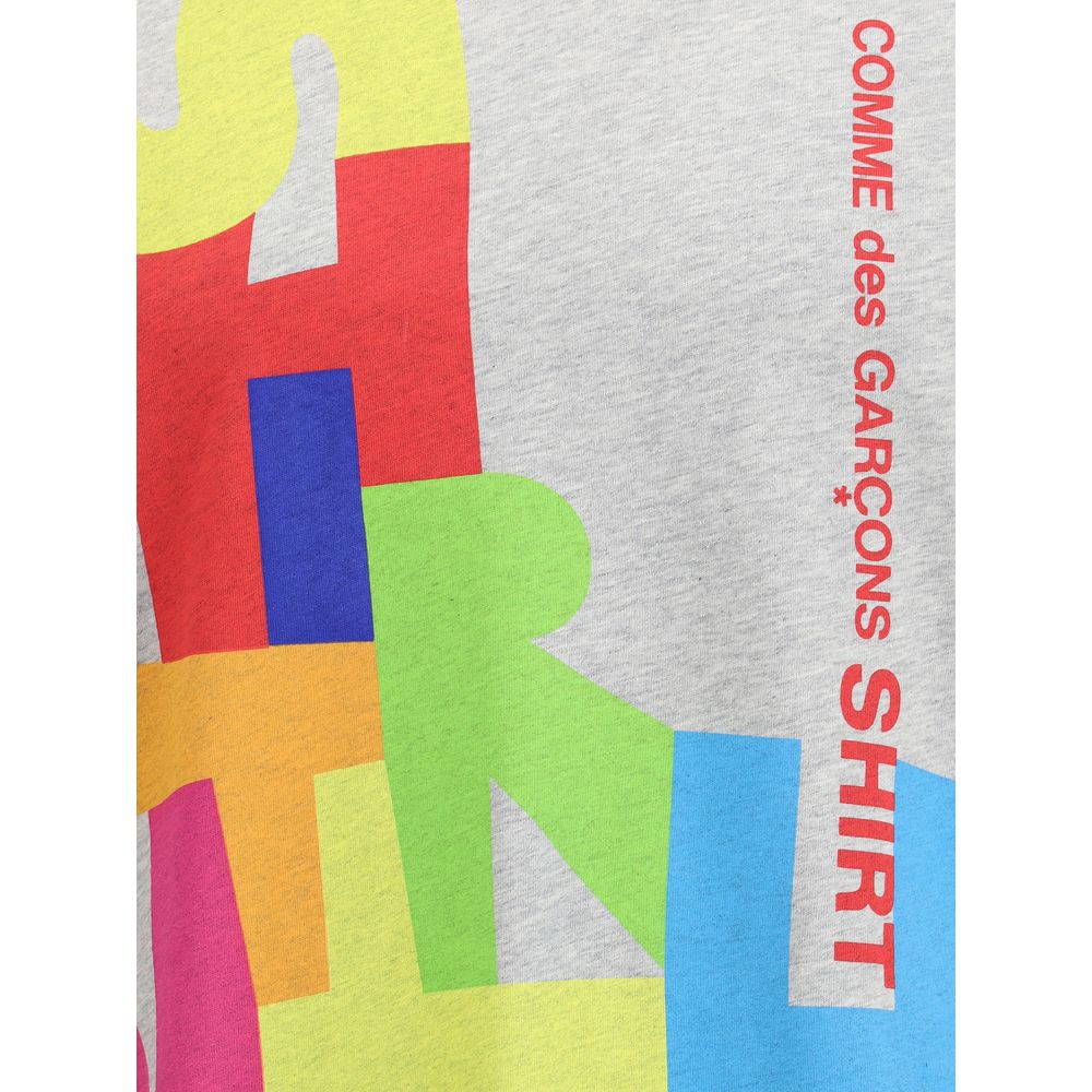 Comme Des Garçons Gray Cotton T-Shirt with multicolor print detail on the front.