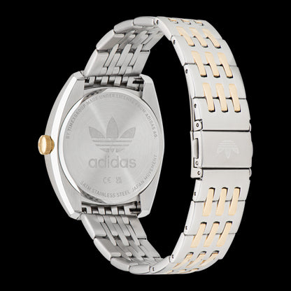ADIDAS Mod. EDITION ONE wristwatch with stainless steel bracelet and water resistance up to 5 ATM, showing the back of the case.