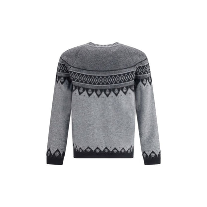 Alexander McQueen Gray Wool Sweatshirt with jacquard skull pattern, ribbed crew neck, comfortable fit, perfect for contemporary style.