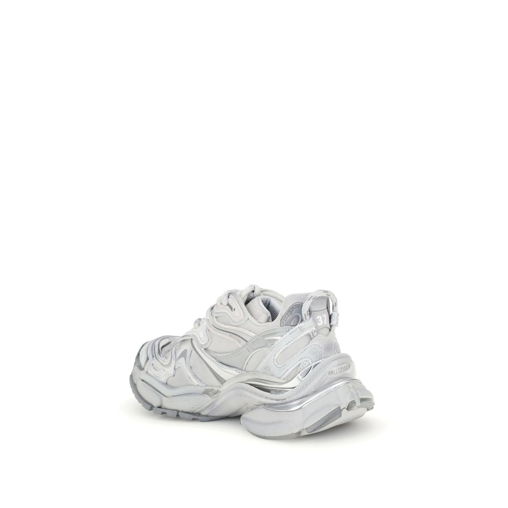 Balenciaga Silver Rubber Athletic Sneakers featuring worn-in design with embossed logos and size detailing, back loop for easy fit.