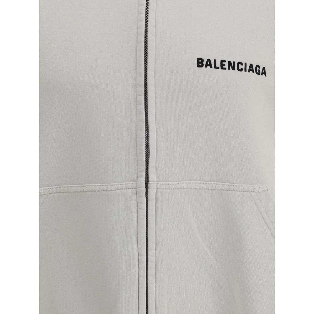 Balenciaga White Cotton Sweatshirt with worn effect and logo, featuring practical patch pockets and detailed hem and cuffs.