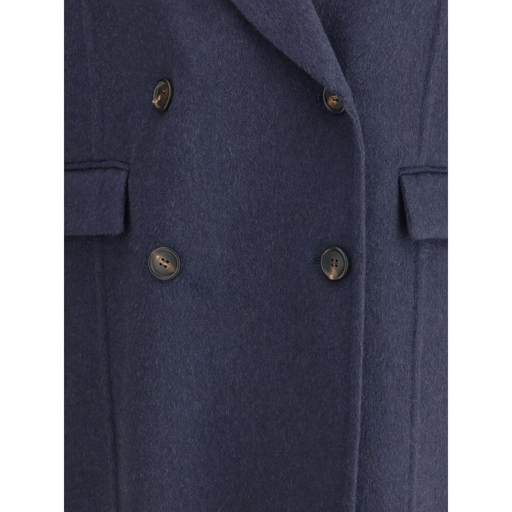 Close-up of Brunello Cucinelli Blue Cashmere Coat with double-breasted closure and welt flap pockets. Elegant and versatile design.