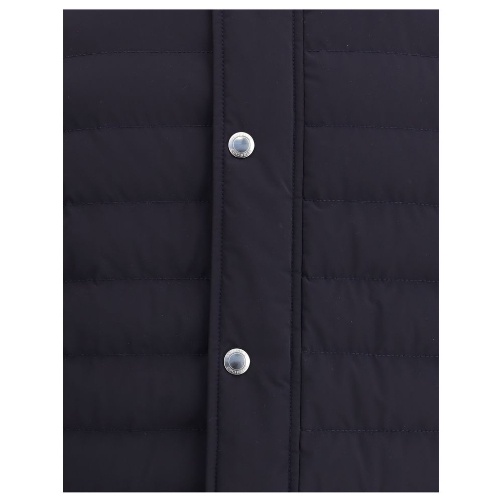 Close-up of Brunello Cucinelli Blue Polyester Coat showing snap-button closure detail