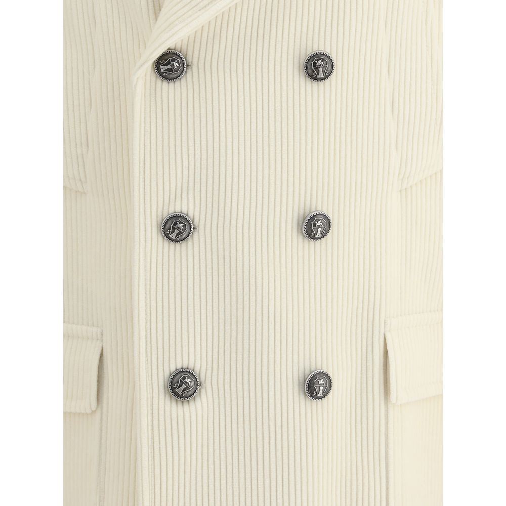 Detailed view of Brunello Cucinelli Cream Cashmere Coat, featuring ribbed texture and elegant metal button closure.